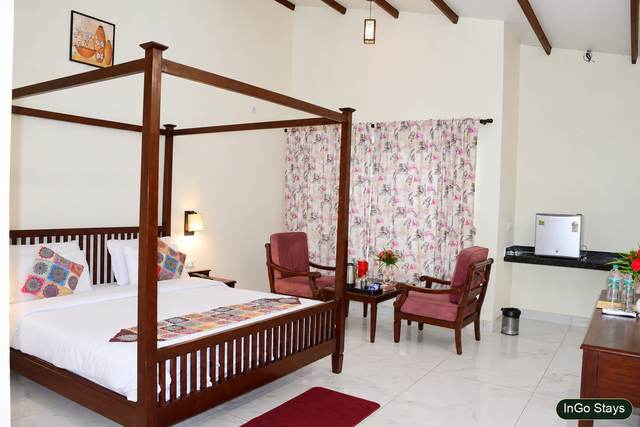 Deluxe room interior at The Big Mama Eco Resort near Jim Corbett National Park
